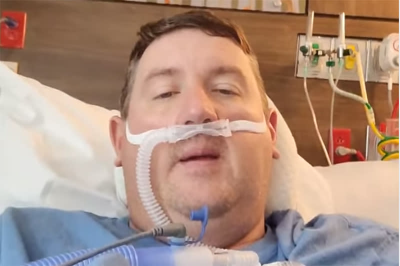 Image: Travis Campbell has been making Facebook videos and posts asking people to get vaccinated against Covid-19 after testing positive and being hospitalized for the virus. (Travis Campbell)