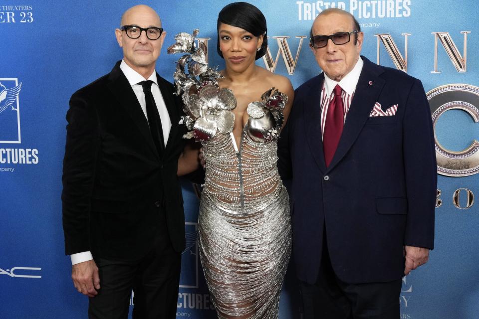Stanley Tucci, left, Naomi Ackie and Clive Davis attend the world premiere of "Whitney Houston: I Wanna Dance with Somebody" at AMC Lincoln Square, in New York World Premiere of "Whitney Houston: I Wanna Dance with Somebody", New York, United States - 13 Dec 2022