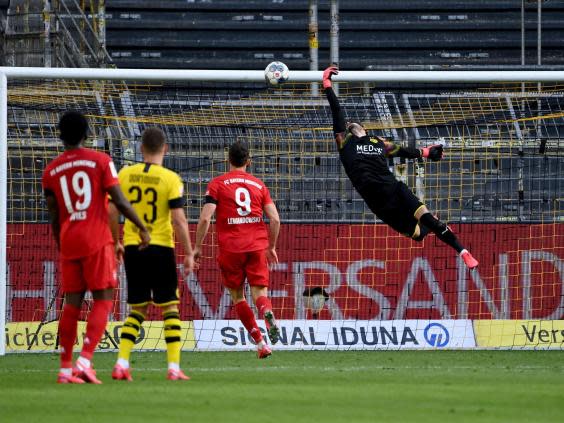 Joshua Kimmich scores against Borussia Dortmund with an audacious chip (Getty)