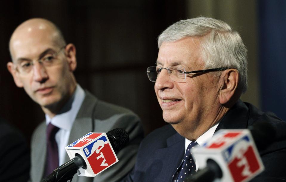 NBA Deputy Commissioner Adam Silver, left, listens as Commissioner David Stern speaks during a basketball news conference following Board of Governors meetings in New York, Thursday, Oct. 25, 2012. Stern announced he will retire on Feb. 1, 2014, 30 years after he took charge of the league. He will be replaced by Silver. (AP Photo/Kathy Willens)