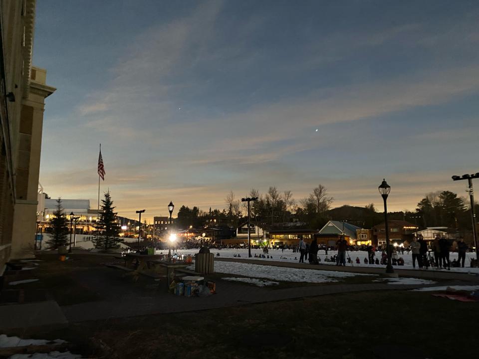 Lake Placid, N.Y. turns an eerie dark during the ellipse