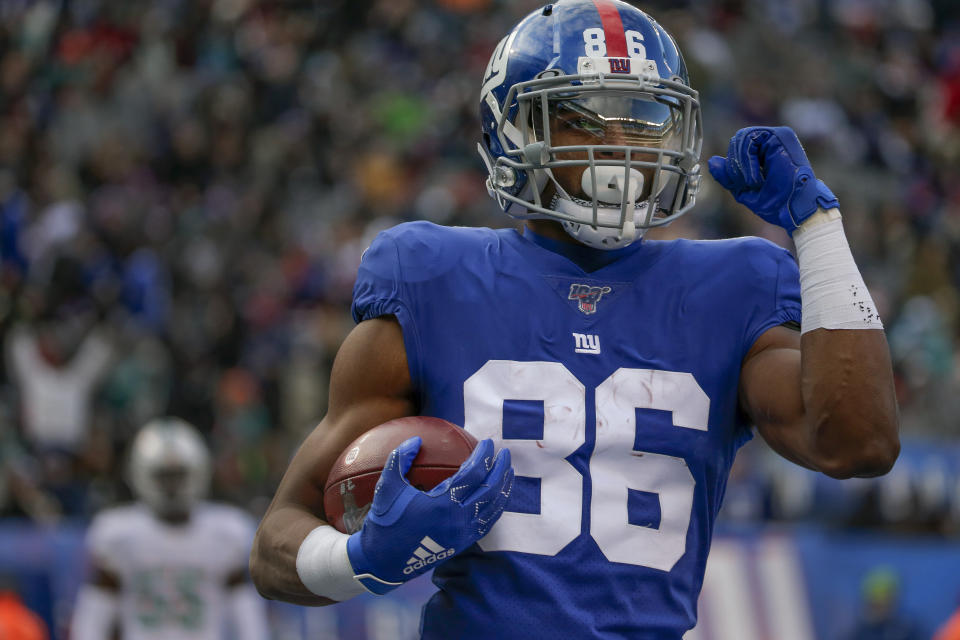 New York Giants wide receiver Darius Slayton (86) reacts after scoring a touchdown against the Miami Dolphins during the third quarter of an NFL football game, Sunday, Dec. 15, 2019, in East Rutherford, N.J. (AP Photo/Seth Wenig)