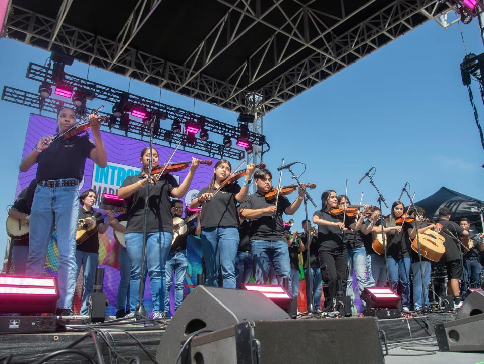 The Cesar Chavez High mariachi band performs at the StepFest event.