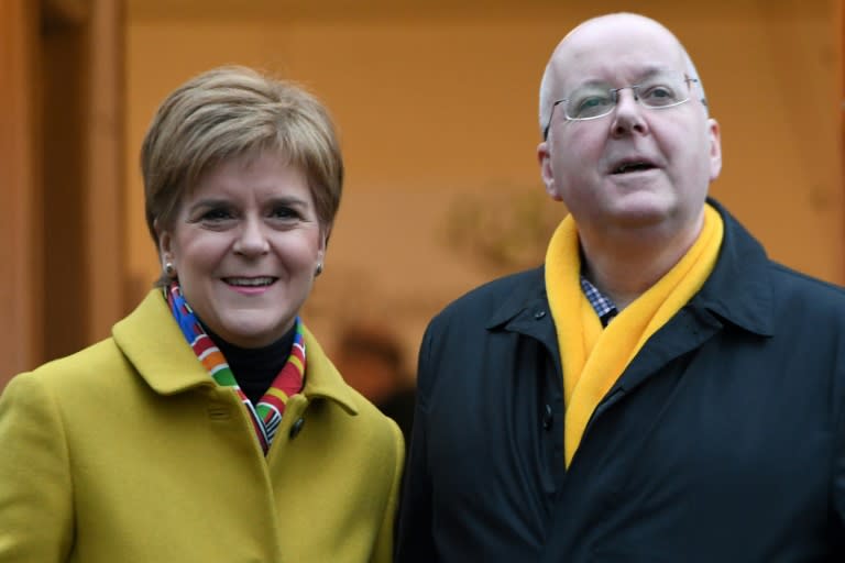 Peter Murrell (R) was arrested in April 2023 after officers searched the home near Glasgow he shared with Nicola Sturgeon (L) (ANDY BUCHANAN)