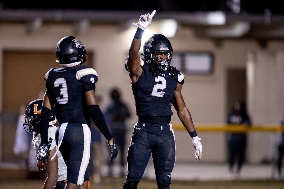 Buchholz Bobcats middle linebacker Myles Graham (2) gestures after a defensive stop during the first half against the Lakeland Dreadnaughts in the Semifinals of the 2023 FHSAA Football State Championships at Citizens Field in Gainesville, FL on Friday, December 1, 2023. [Matt Pendleton/Gainesville Sun]