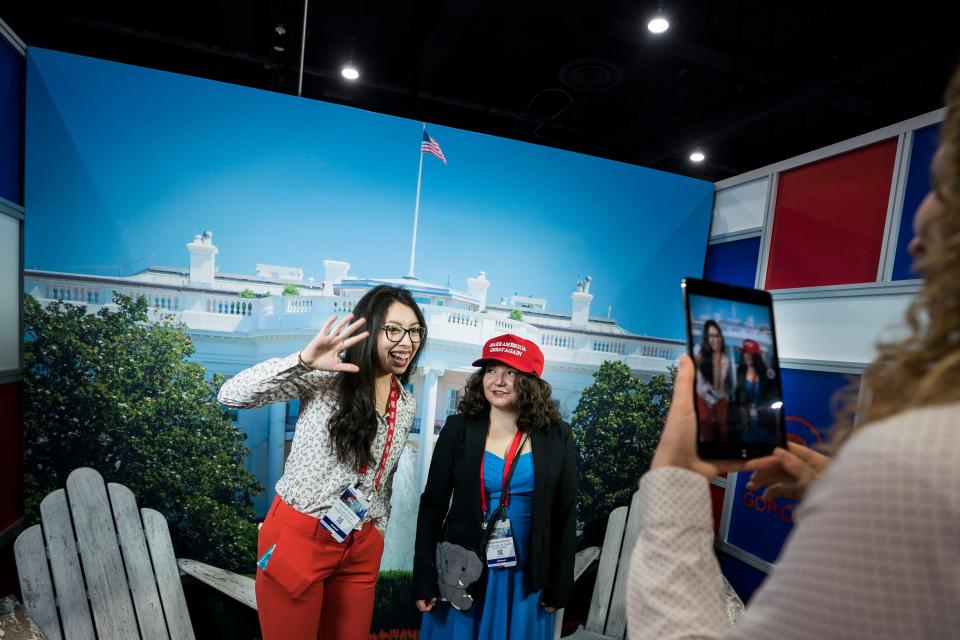 <p>Conservative Political Action Conference (CPAC) attendees Carolina Cisneros (L) and Abigail Brookshire (R) pose for a photograph at the 45th annual conference at the Gaylord National Resort & Convention Center in National Harbor, Md., Feb. 22, 2018. (Photo: Jim Lo Scalzo/EPA-EFE/REX/Shutterstock) </p>