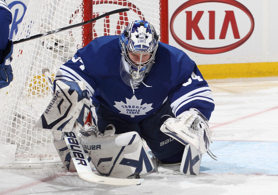 OTTAWA, CANADA - FEBRUARY 4: James Reimer #34 of the Toronto Maple Leafs makes one of his forty-nine saves on the way to a shutout during an NHL game against the Ottawa Senators at Scotiabank Place on February 4, 2012 in Ottawa, Ontario, Canada. (Photo by Jana Chytilova/Freestyle Photography/Getty Images)