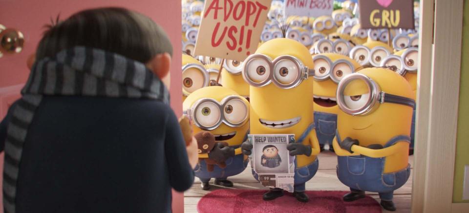 This image released by Universal Pictures shows characters, from left, Gru, voiced by Steve Carell, Bob, Kevin and Stuart in a scene from "Minions: The Rise of Gru." (Illumination Entertainment/Universal Pictures via AP)