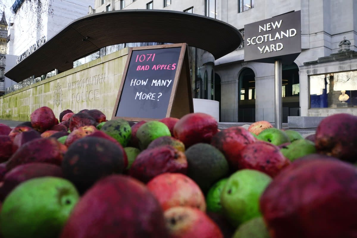 Rotten apples placed outside New Scotland Yard as part of a protest (PA Wire)