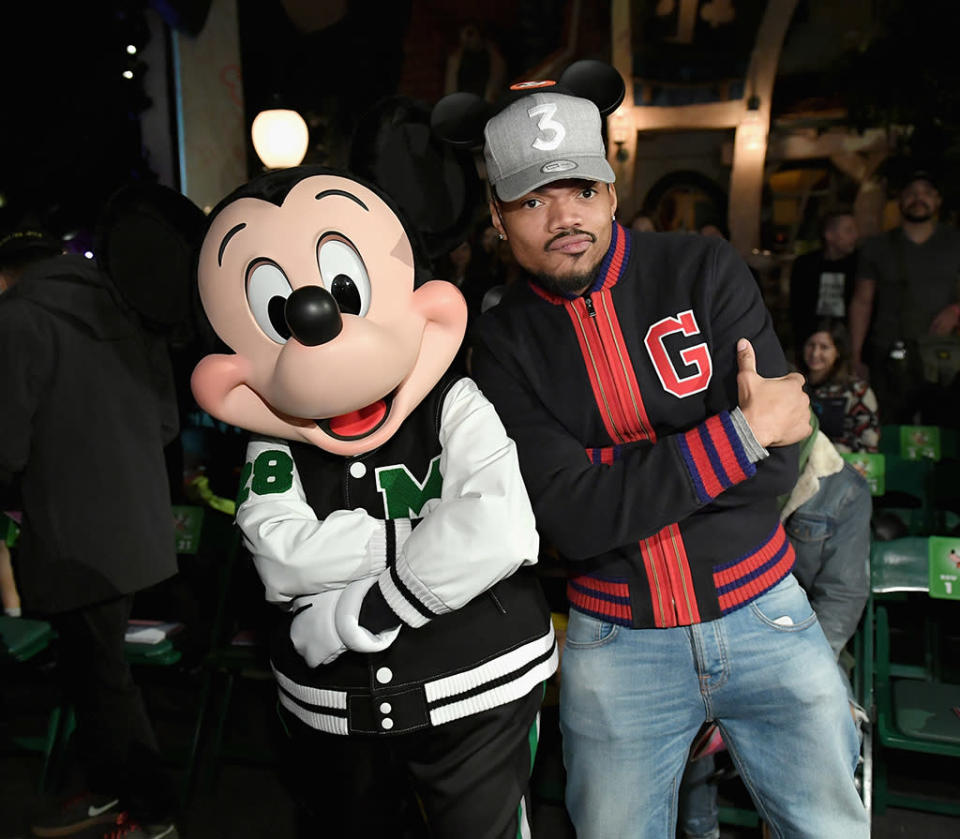 <p>The hip-hop star got a chance to pose with his boy Mickey Mouse on Wednesday at the launch of “Mickey the True Original” campaign, a celebration of the famoue mouse’s 90th birthday. The festivities at Disneyland in Anaheim, Calif. included a fashion show featuring a Mickey-inspired collection by Opening Ceremony. (Photo: Neilson Barnard/Getty Images for Disney) </p>