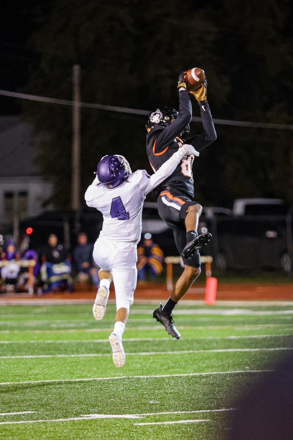 Pawhuska’s Deacon Hendren goes vertical to bring down a pass during a 2021 game vs. Hominy.