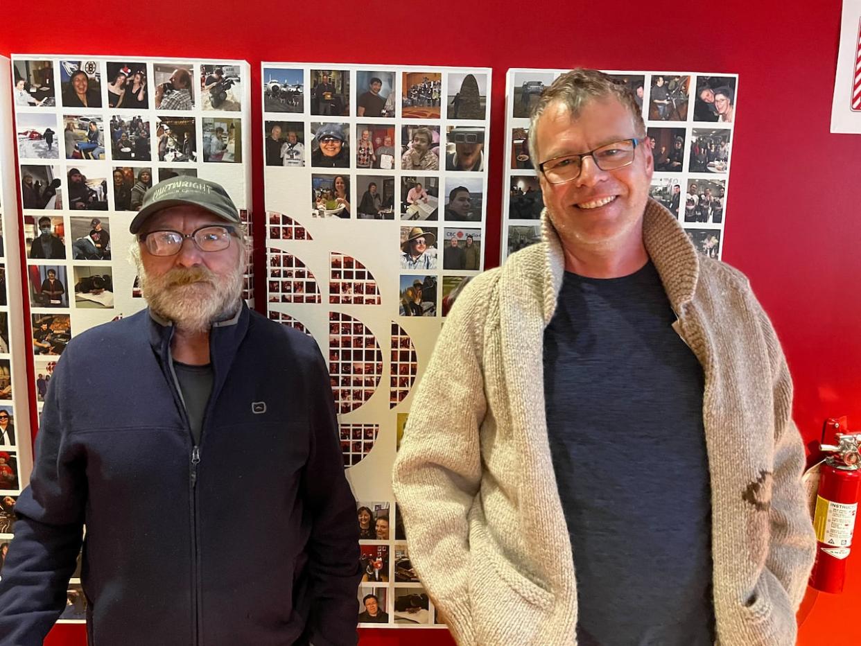 Sam Roberts, left, and Mark Elson, right, inside the CBC North building in Yellowknife on Oct. 17, 2023. The men are safe and sound after spending three days lost on the shores of Great Slave Lake.  (Hilary Bird/CBC - image credit)