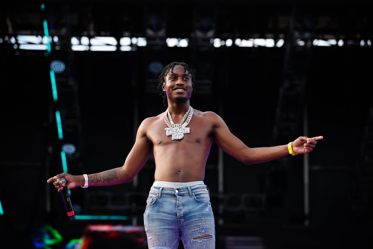 File: Lil Tjay performs on stage in Miami Gardens, Florida, on 25 July 2021  (Getty)