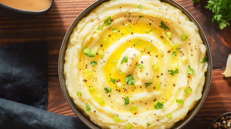 Bowl of mashed potatoes with butter