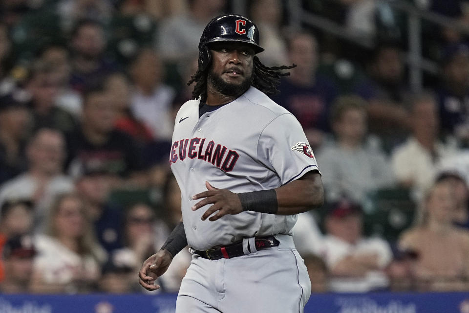 Cleveland Guardians designated hitter Josh Bell scores on a double by Bo Naylor during the second inning of a baseball game against the Houston Astros, Monday, July 31, 2023, in Houston. (AP Photo/Kevin M. Cox)