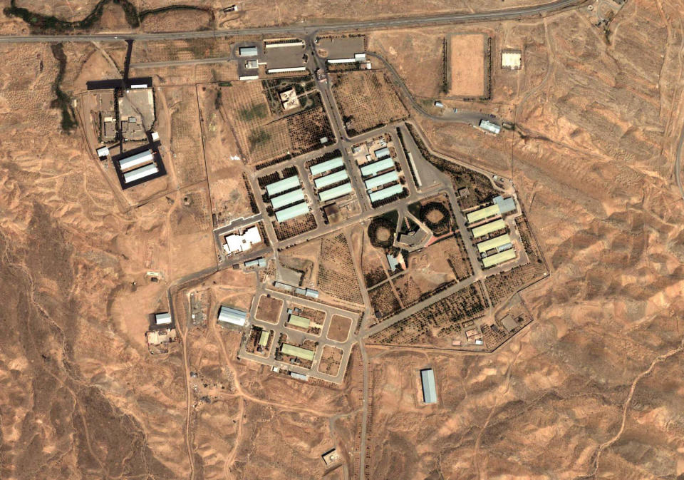 This Aug. 13, 2004 satellite image provided by DigitalGlobe and the Institute for Science and International Security shows the military complex at Parchin, Iran, 30 km (about 19 miles) southeast of Tehran. Six world powers urged Iran, Thursday March 8, 2012, to open its Parchin military site to International Atomic Energy Agency perusal, amid reports that Tehran might be cleaning it of evidence of nuclear arms related experiments_a request echoed by other speakers at the 35-nation IAEA board meeting. Concerns about Parchin are high. Diplomats who spoke to The Associated Press on Wednesday based their assessment on new satellite images (not the one shown) of the Iranian military facility they said appeared to show trucks and earth-moving vehicles, indicating a possible attempted cleanup of radioactive traces. (AP Photo/DigitalGlobe - Institute for Science and International Security)