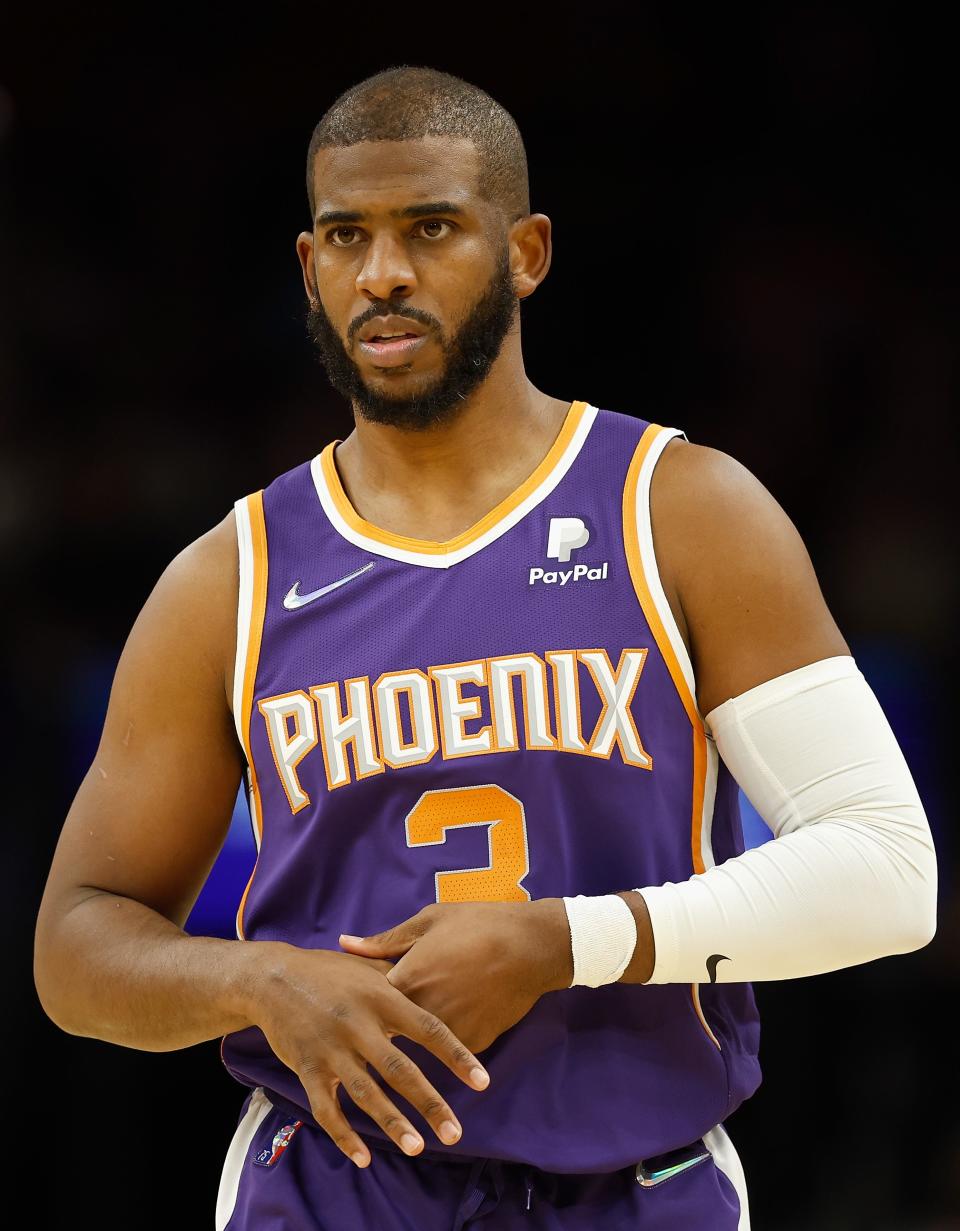 Chris Paul holds his hand after suffering an injury during last Wednesday's game against the Rockets.