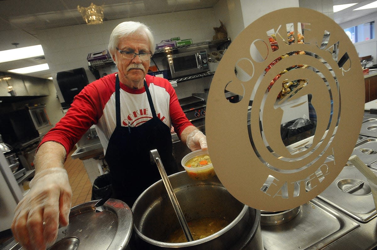 Glen Koch serves up a bowl of Curry Chicken Rice soup at the Cookie Jar Eatery in downtown Sioux Falls on Monday, Jan. 19, 2015.