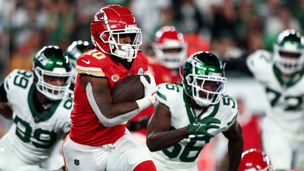  Isiah Pacheco #10 of the Kansas City Chiefs carries the ball during the third quarter of an NFL football game against the New York Jets at MetLife Stadium on October 1, 2023 . 