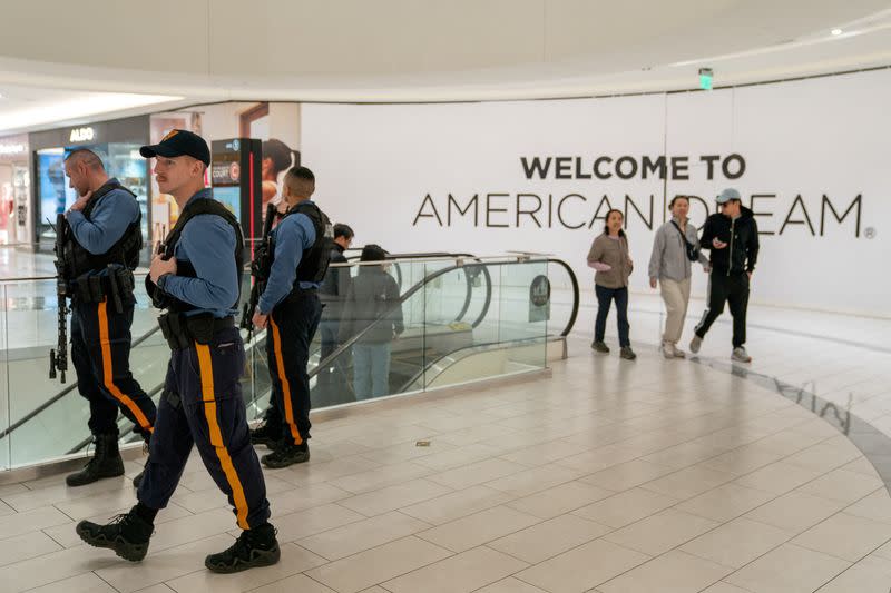 New Jersey State Troopers patrol the American Dream Mall after a bomb scare