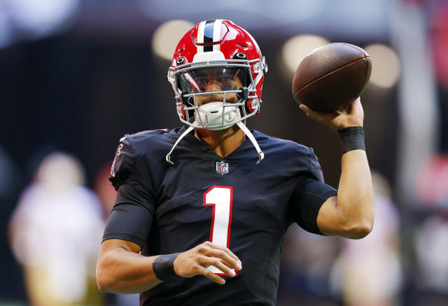 LOOK: Falcons take field wearing red throwback helmets