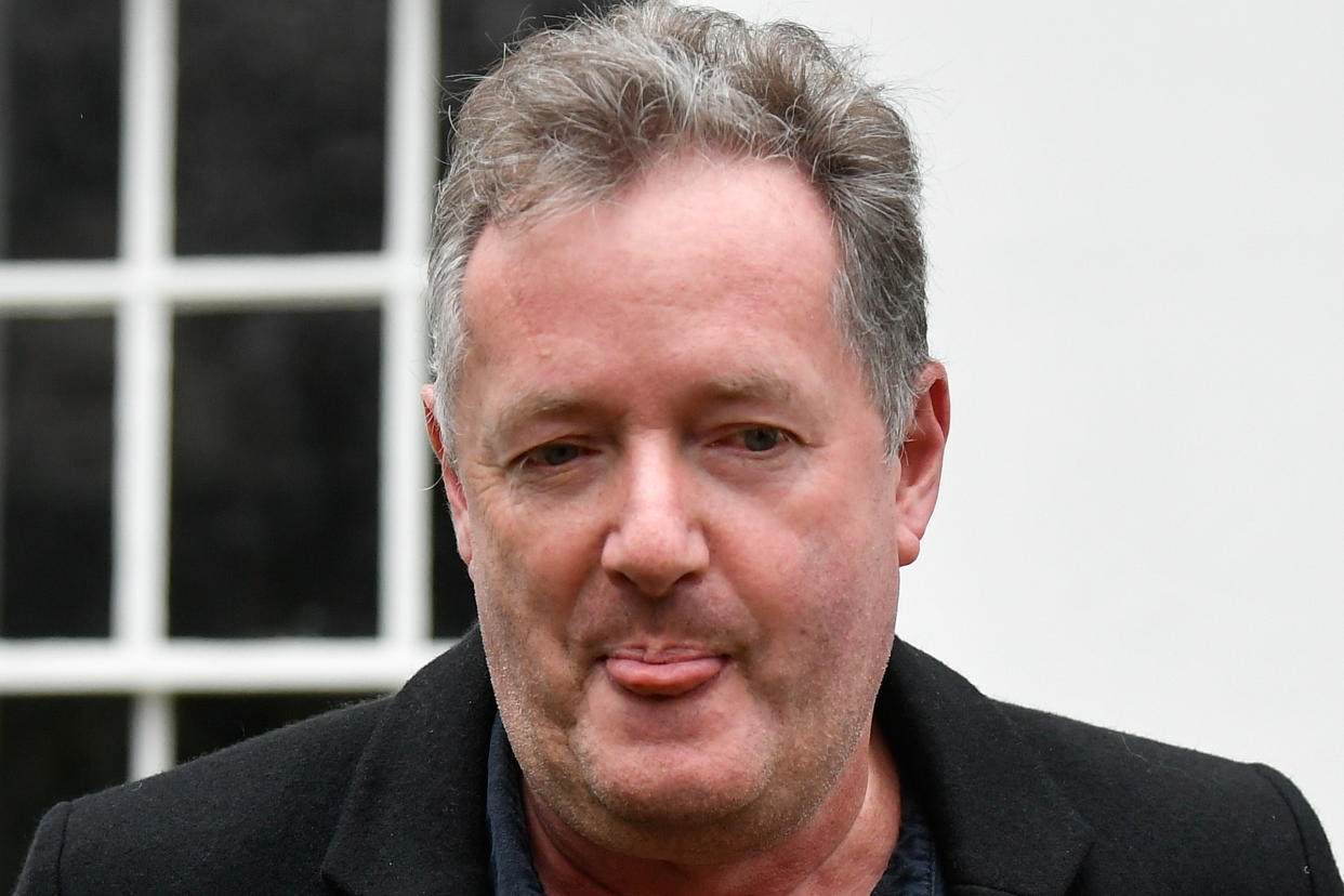 Journalist and television presenter Piers Morgan reacts as he takes his daughter Elise to school, after he left his high-profile breakfast slot with the broadcaster ITV, following his long-running criticism of Prince Harry's wife Meghan, in London, Britain, March 10, 2021. REUTERS/Toby Melville