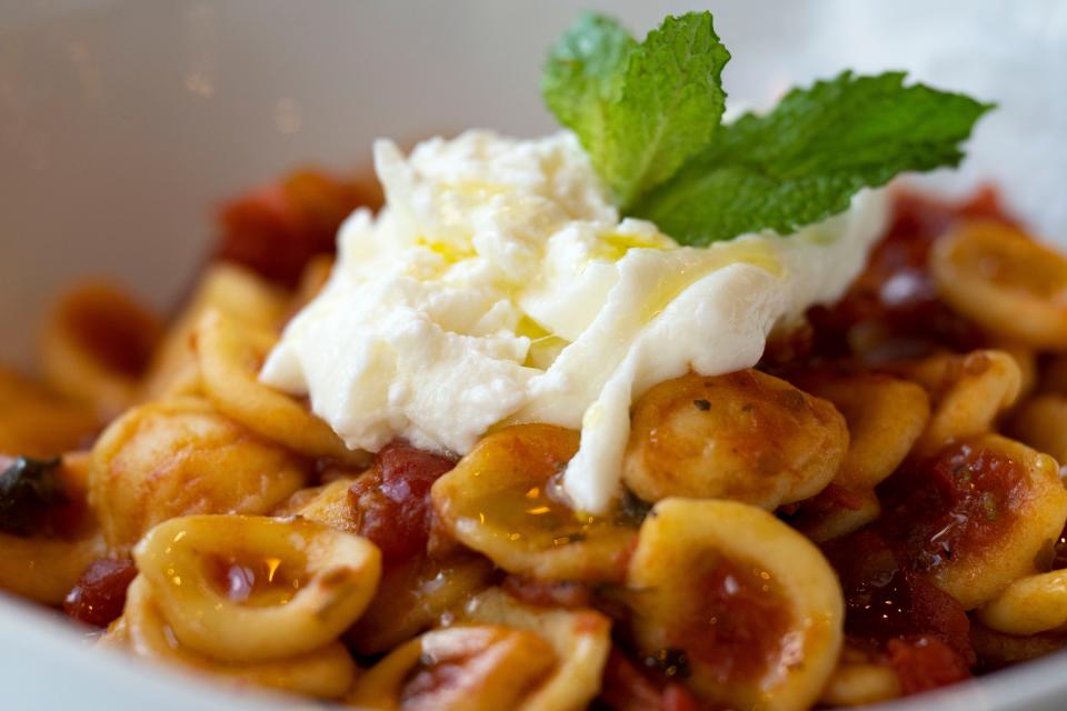 A view of the Pugliese dish involving orecchiette pasta, fresh mint, cooked tomatoes, sun-dried tomatoes and Burrata cheese at VV.