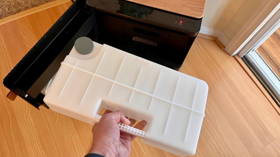 A photo of the Roomba's clean-water reservoir tank.