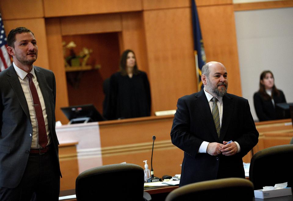 Assistant New Hampshire Attorney Generals Christopher Knowles (at left) and Benjamin Agati stand as potential jurors enter the courtroom at jury selection for the Adam Montgomery murder trial at Hillsborough County Superior Court in Manchester, N.H, on Feb. 6, 2024. He is accused of killing his five-year-old daughter, Harmony. David Lane/UNION LEADER POOL