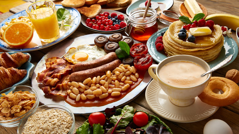 stacked plates from breakfast buffet