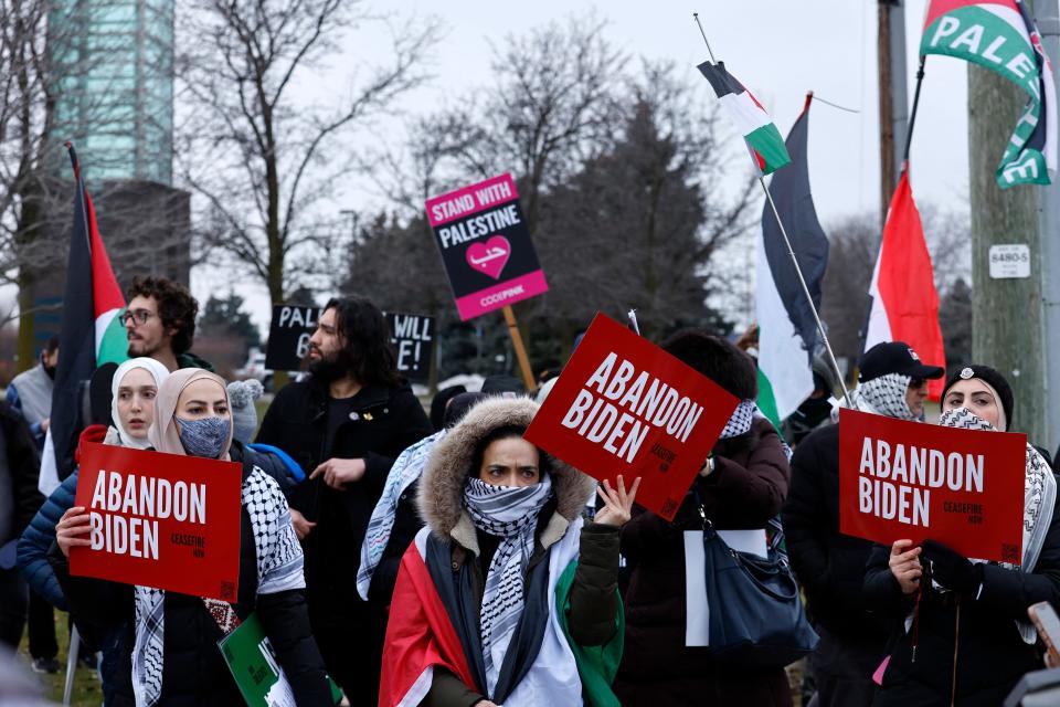 People gather in support of Palestinians outside where President Joe Biden is speaking to members of the United Auto Workers in Warren, Mich., on Feb. 1, 2024.