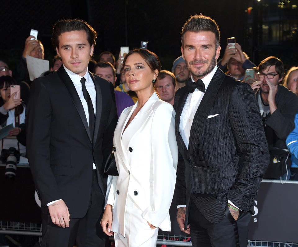 LONDON, ENGLAND - SEPTEMBER 03: Brooklyn Beckham, Victoria Beckham and David Beckham attend the GQ Men Of The Year Awards 2019 at Tate Modern on September 03, 2019 in London, England. (Photo by Karwai Tang/WireImage)