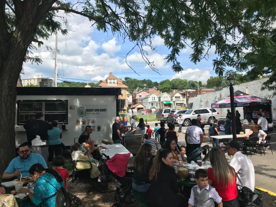 Part of the big crowd at Sunday's grand opening at Monroy Supermarket.