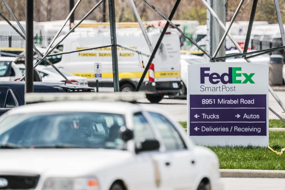Investigators on the scene following a mass shooting at a FedEx facility in Indianapolis on April 16, 2021.