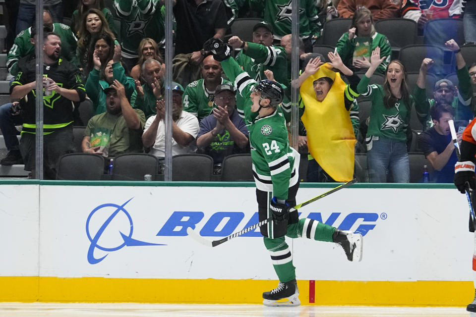 Dallas Stars center Roope Hintz celerates his second period goal against the Philadelphia Flyers during an NHL hockey game, Saturday, Oct. 21, 2023, in Dallas. (AP Photo/Julio Cortez)