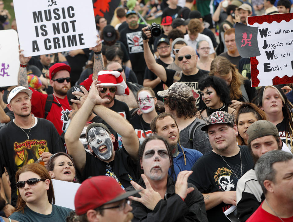 <p>Juggalos, as supporters of the rap group Insane Clown Posse are known, gather in front of the Lincoln Memorial in Washington during a rally, Saturday, Sept. 16, 2017, to protest and demand that the FBI rescind its classification of the juggalos as “loosely organized hybrid gang.” (Photo: Pablo Martinez Monsivais/AP) </p>