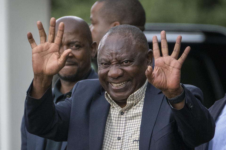 South African President Cyril Ramaphosa leaves an African National Congress (ANC) national executive committee in Johannesburg, South Africa, Monday Dec. 5, 2022. Ramaphosa might lose his job, and his reputation as a corruption fighter, as he faces possible impeachment over claims that he tried to cover up the theft of millions of dollars stashed inside a couch on his farm. (AP Photo/Jerome Delay)