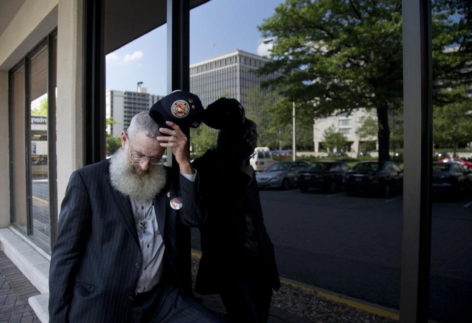 Keith Maupin pauses as he talks about his son, Sgt. Matt Maupin, in Arlington, Va.,Tuesday, May 13, 2014. A man in Iraqi custody has confessed to killing Sgt. Matt Maupin whose remains were found in 2008. Sgt. Matt Maupin, of Batavia in southwestern Ohio, was captured when insurgents with rocket-propelled grenades and small arms ambushed his fuel convoy near Baghdad on April 9, 2004. Keith Maupin decided to grow his beard until his son came home. He has never cut it. (AP Photo)