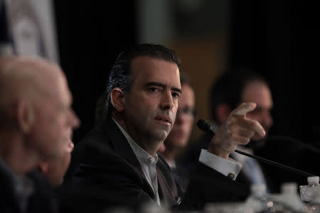 Chairman of the Federal Fiscal Control Board Jose Carrion III (C) attends a meeting of the Financial Oversight and Management Board for Puerto Rico at the College of Engineers and Land Surveyors in San Juan, Puerto Rico October 31, 2017. REUTERS/Alvin Baez