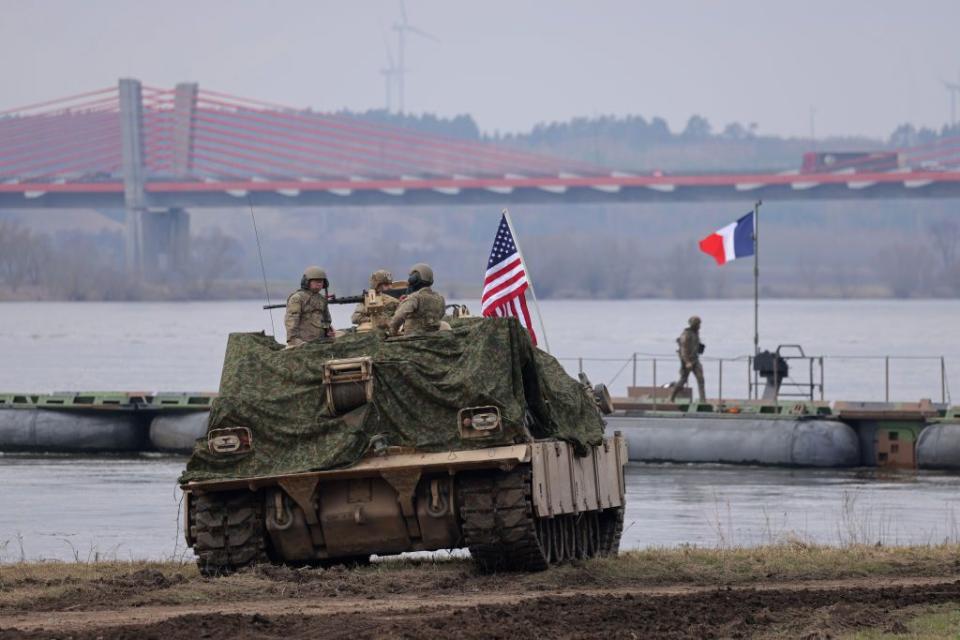 U.S. and French forces take part in a NATO military exercise near Gniew, Poland, on March 5, 2024. (Sean Gallup/Getty Images)