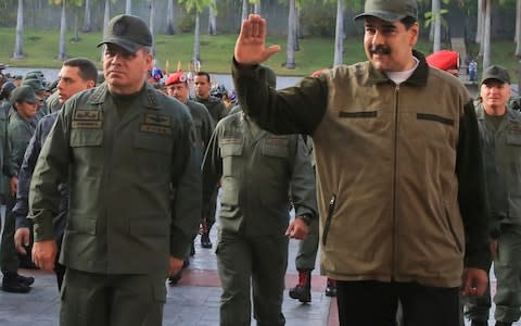 On Thursday, Mr Maduro addressed troops with Gen. Lopez by his side, insisting he was in control of the military - Credit: Jhonn Zerpa/Miraflores Press Office
