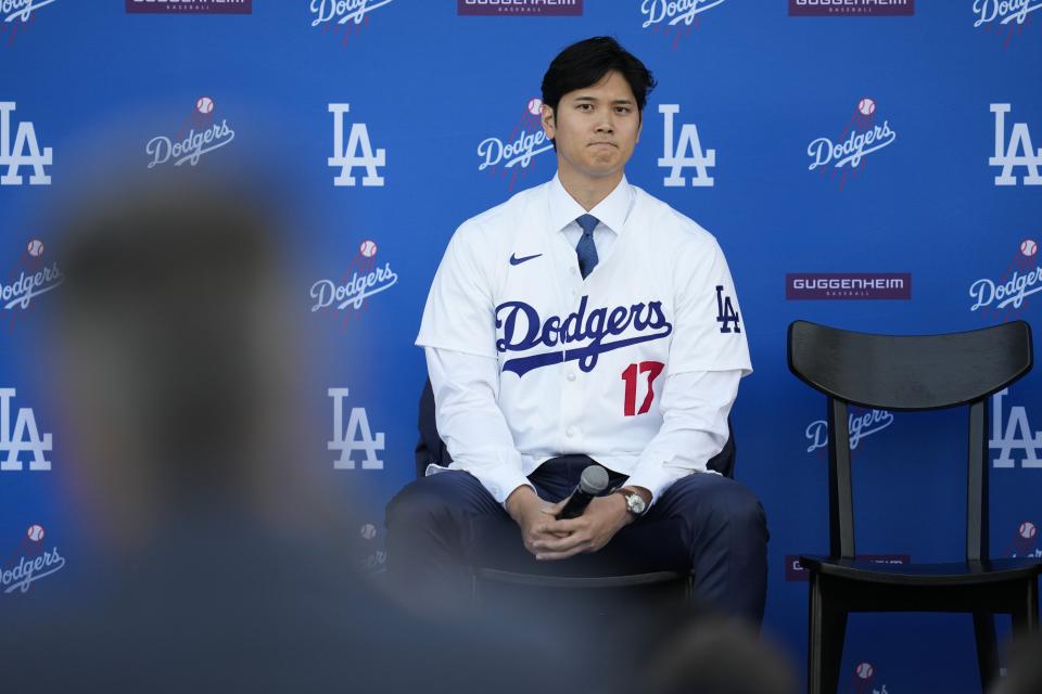 Los Angeles Dodgers’ Shohei Ohtani listens to questions during a baseball news conference at Dodger Stadium Thursday, Dec. 14, 2023, in Los Angeles. | Ashley Landis, Associated Press