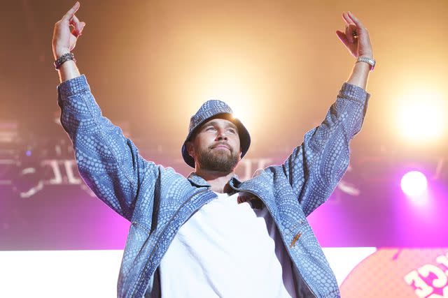 <p>Kyle Rivas/Getty </p> Travis Kelce, of the Kansas City Chiefs, entertains the crowd during Kelce Jam at Azura Amphitheater on April 28, 2023 in Bonner Springs, Kansas.