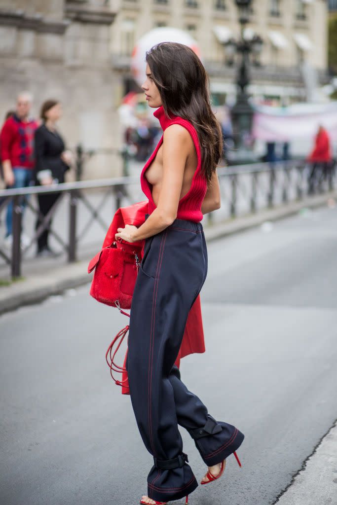 <p>Sara Sampaio's sweater is all business from the front, party from the side. </p>