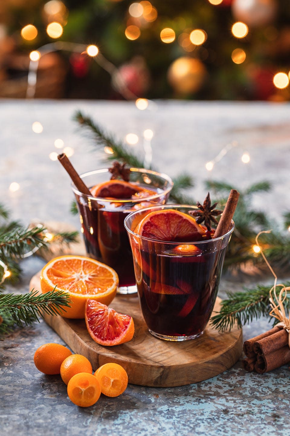 two glasses of christmas hot mulled wine with spices