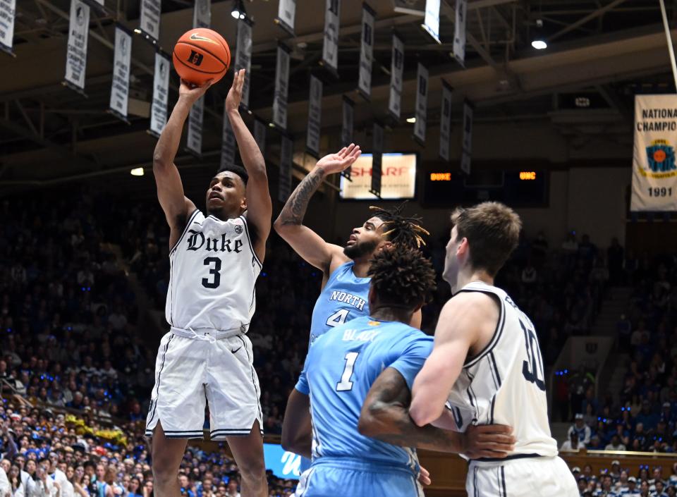 Duke guard Jeremy Roach (3) shoots in front of North Carolina guard RJ Davis (4). (Rob Kinnan, USA TODAY Sports)