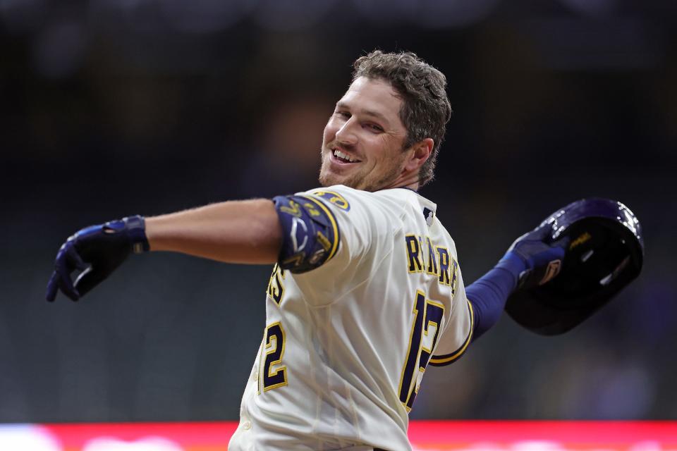 The Brewers' Hunter Renfroe celebrates a walk-off single against the Diamondbacks on Monday night at American Family Field. He also had a homer in the ninth.