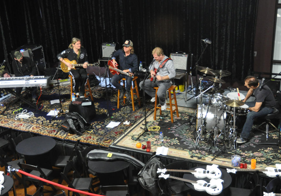 Members of the rock group Night Ranger practice a new song, Monday, March 25, 2013, at the Brennan Rock & Roll Academy in Sioux Falls, S.D. The band is performing a benefit concert Tuesday during the grand opening of the $3.6 million center, which will give Boys &Girls Clubs members the chance to learn guitar, bass, keyboards, drums or vocals. (AP Photo/Dirk Lammers)