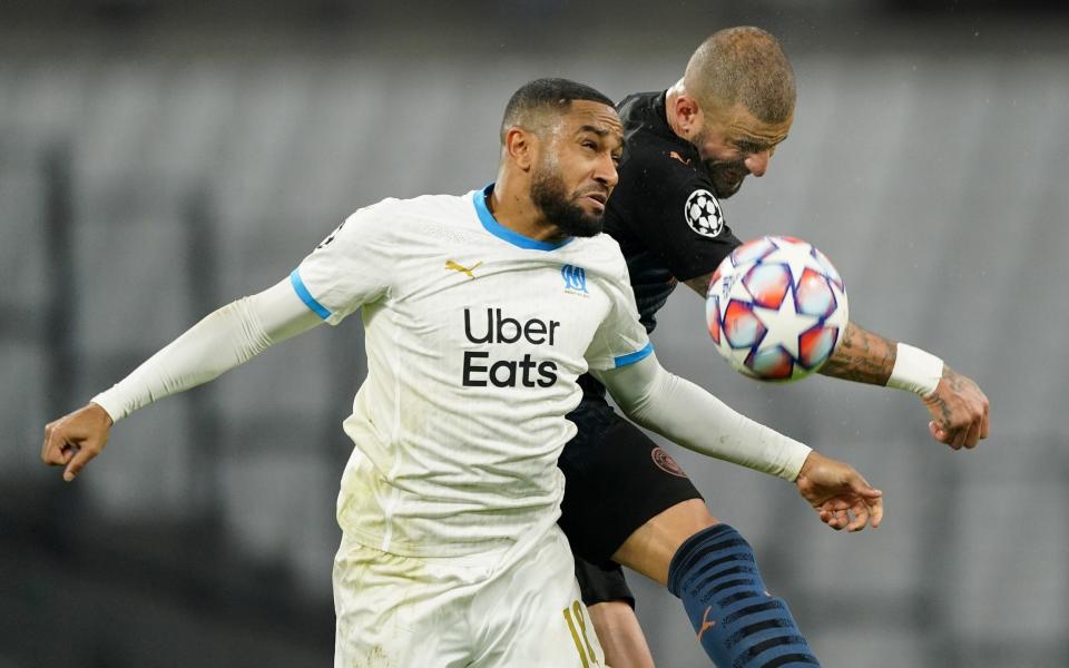 Jordan Amavi of Marseille battles for possession with Kyle Walker of Manchester City during the UEFA Champions League Group C stage match between Olympique de Marseille and Manchester City at Stade Velodrome on October 27, 2020 in Marseille, France. - GETTY IMAGES