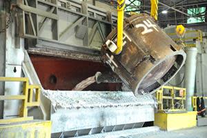 Recycled molten metal, after being siphoned from a melting furnace at Arconic’s Tennessee operations, is added to a holding furnace to make cast weight according to customer specifications.